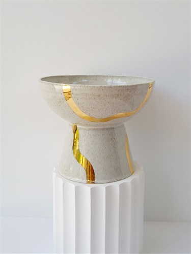 1st Prize ($500): Mim Johnson for Gold Trails Pedestal bowl, iron speckled stoneware, white glaze and gold lustre (ceramic work).