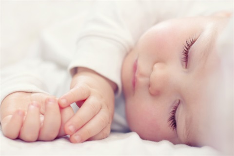 Infant sleeping on side