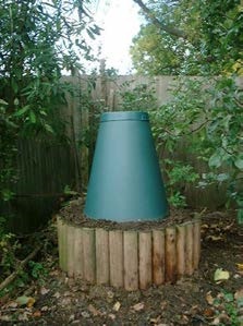 Example of a Green Cone installed within a raised bed