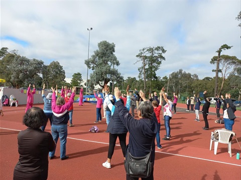 Group image of seniors on a walking track